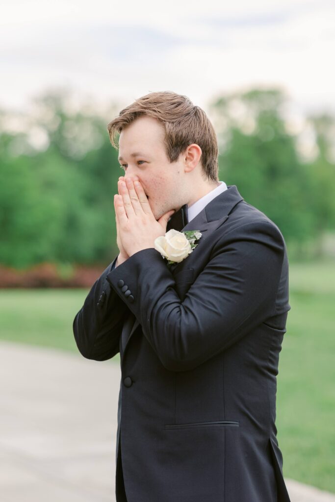 Groom's face during first look