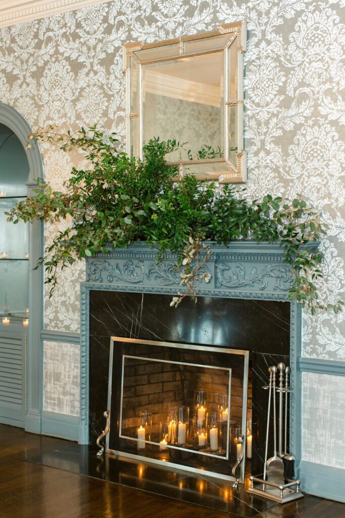 Floral design over fireplace for New Jersey wedding