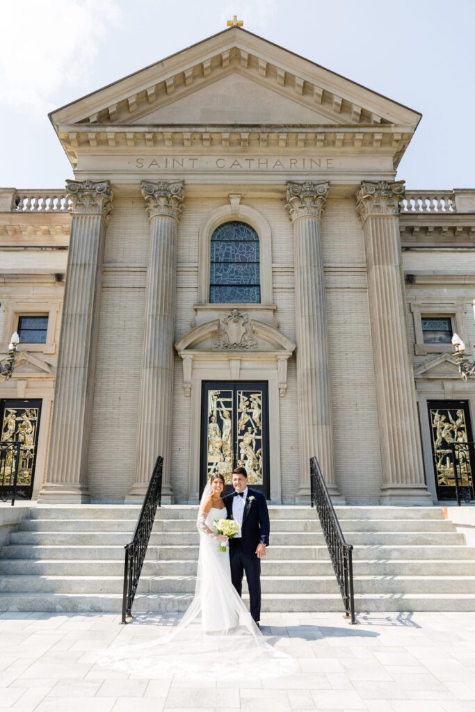 Bride and groom portrait in front of St. Catharine's Church in Spring Lake, NJ