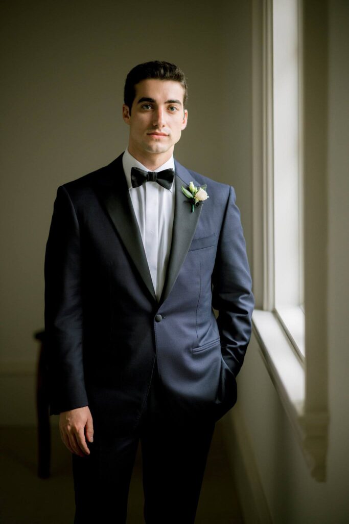 Groom portrait while getting ready for spring New Jersey wedding