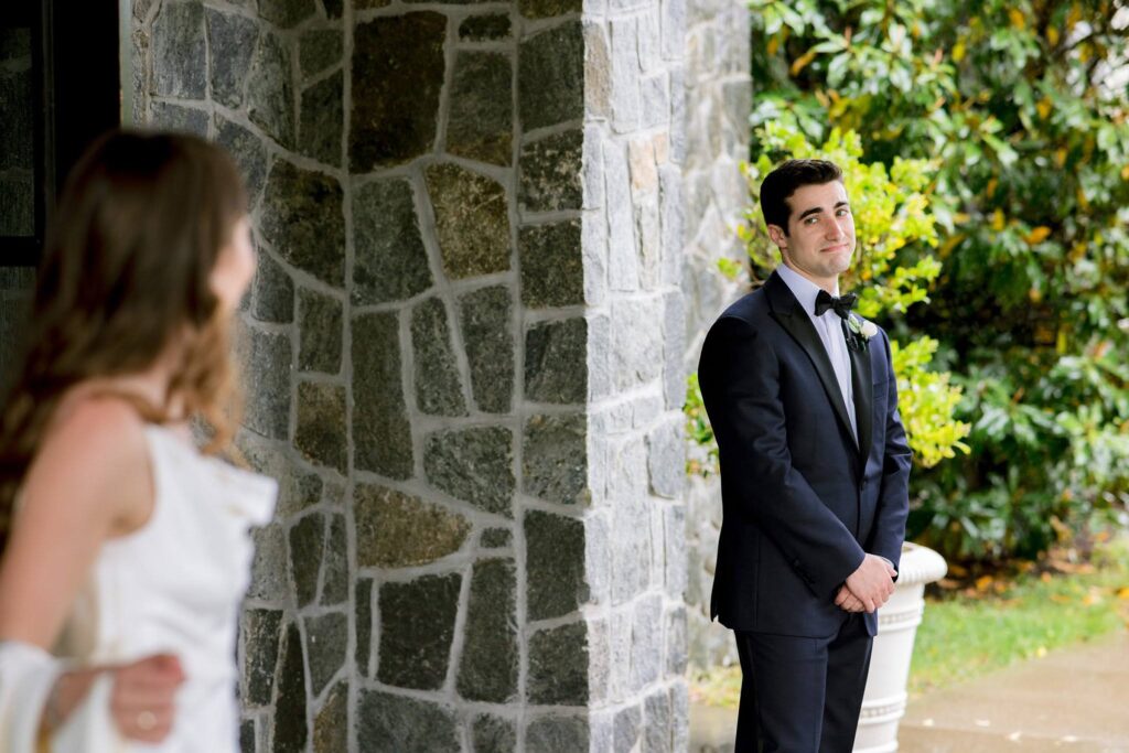 Groom first look reaction when seeing bride
