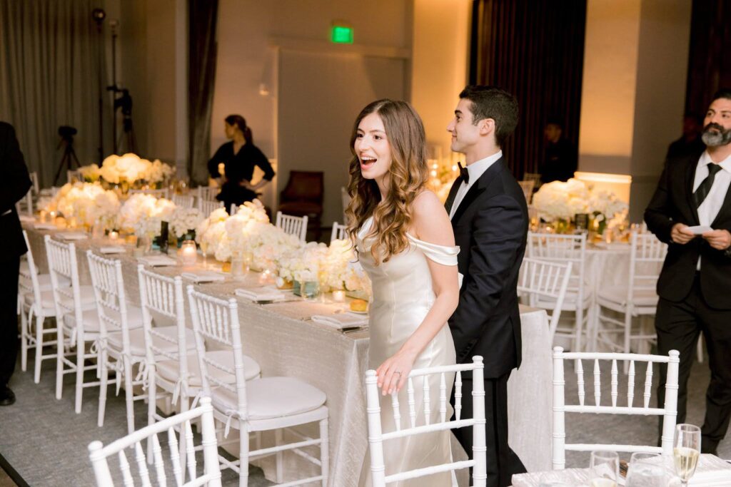Bride and groom reaction to seeing wedding reception space at the Alpine Country Club